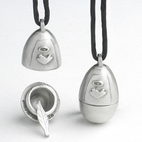 egg-shaped pewter pendant with stylized angel's wing carved on the front; a tiny pewter feather charm sits inside
