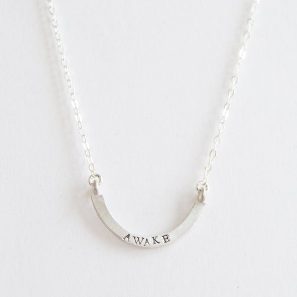 awake cup half full necklace