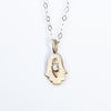 14k gold tiny hamsa amulet {starts at $320}