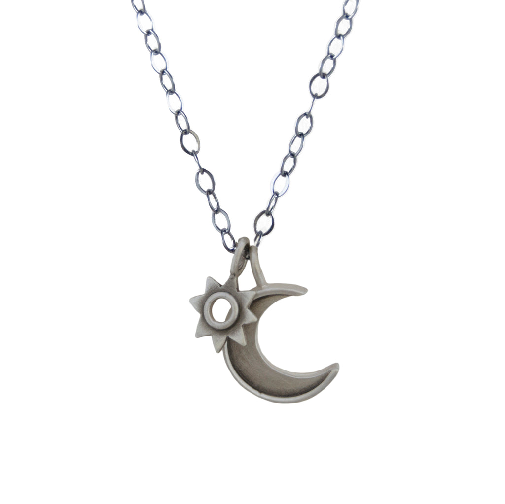 milagro with small crescent necklace
