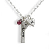 Sterling silver word bar necklace with your choice of charms. Choose inspirational words and custom charms to create the perfect gift. 