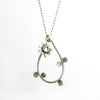 bittersweet teardrop necklace with botanical charm