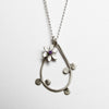 bittersweet teardrop necklace with botanical charm